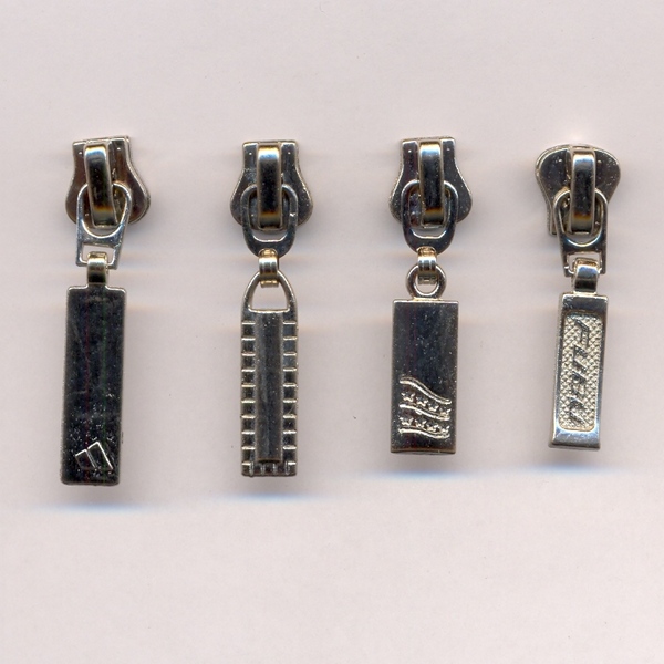 Бегунок на тракторную молнию тип 5 никель уп- 50шт Бегунок на тракторную молнию тип 5 никель уп- 50шт